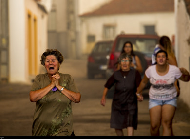 Residents flee in panic from the village Aldeia do Mato.