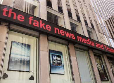 News headlines scroll above the Fox News studios in the News Corporation headquarters building in New York, Tuesday, Aug. 1, 2017.