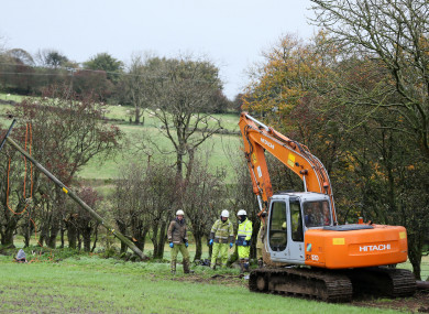 An emergency crew from NI Networks work on a fallen electricity pole in Ballyclare, Co Antrim.