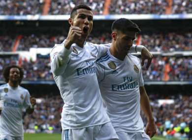 Cristiano Ronaldo celebrates with Marco Asensio.