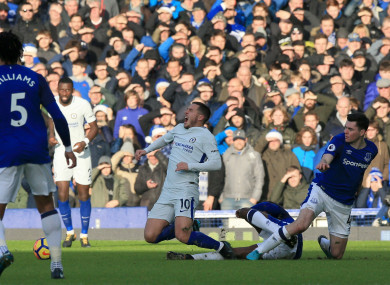 Chelsea's Eden Hazard (centre) reacts after a tackle during the Premier League match at Goodison Park.