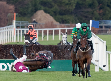 Paul Townend onboard Footpad on his way to winning as Davy Russell falls on Death Duty at the last.