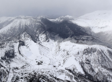 Ashes from Mount Kusatsu-Shirane cover near its summit after its eruption in Kusatsu, Gunma prefecture, central Japan.