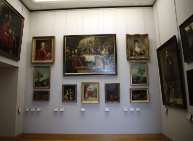 Paintings looted by Nazis during World War II, are on display at the Louvre museum, in Paris