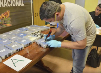 A Russian diplomatic official and an Argentine police officer are among those arrested.
