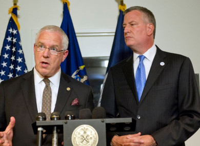 File photo of NYPD Deputy Commissioner of Intelligence and Counterterrorism John Miller and Mayor Bill de Blasio