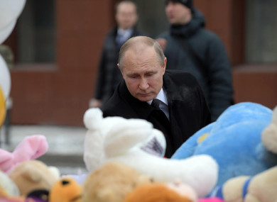 Putin pays respect to the victims of the fire at a shopping centre in Kemerovo