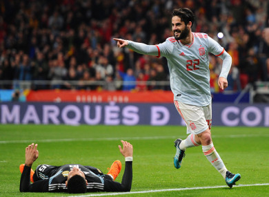 Isco of Spain celebrates after scoring his side's third goal.