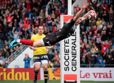 Ashton celebrates in trademark fashion.