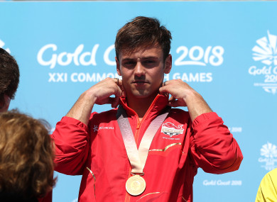 England's Tom Daley with his gold medal in the Men's Synchronised 10m Platform Final at the Optus Aquatic Centre during day nine of the 2018 Commonwealth Games