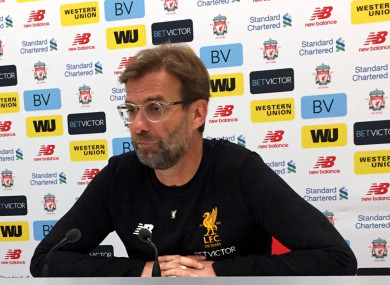 Klopp wore an Irish tricolour Liver Bird badge at this morning's press conference.