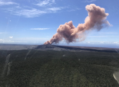 In this photo released by US Geological Survey, ash plume rises above the Puu Oo vent, on Hawaii's Kilaueaa Volcano.
