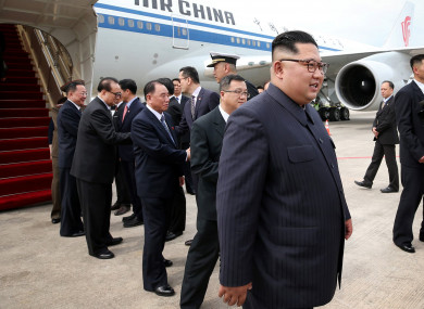Kim disembarking his plane