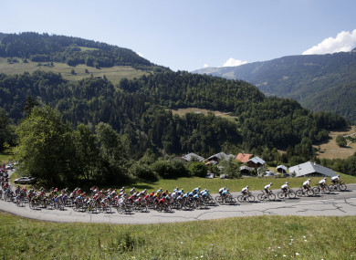 The pack climbs Col du Pre pass during the 11th stage of the Tour de France.