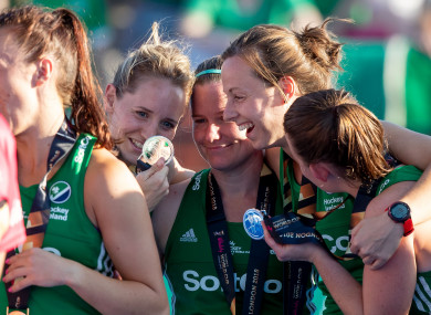 Members of the Irish women's hockey team celebrate with their silver medals following the World Cup earlier this month