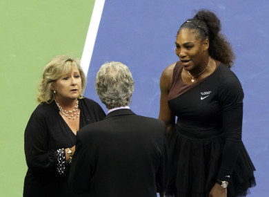 Donna Kelso of the WTA (left), and Brian Earley, tournament head referee. talk with Serena Williams of the United States (right) after chair umpire Carlos Ramos gave a game to Naomi Osaka of Japan for a third rule infraction.