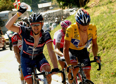 Landis (left) in action alongside Armstrong back in 2004.