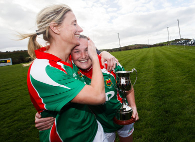 Cora Staunton and Michelle McGing celebrate after the game.