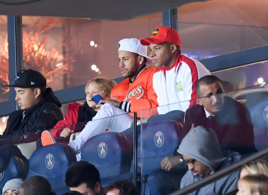 Neymar and Mbappe: watched Saturday's win from the stands.