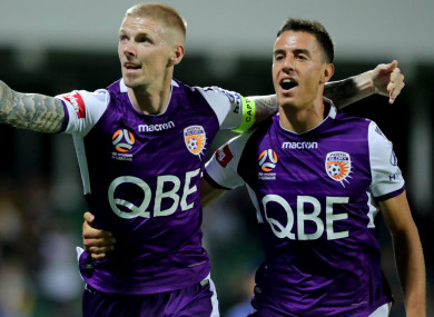 Andy Keogh (left) celebrates after scoring Perth Glory's opener against Brisbane Roar.