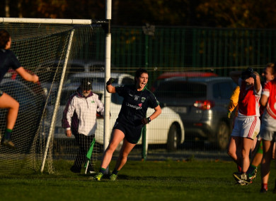 Róisín McGovern of Foxrock-Cabinteely, centre, celebrates after scoring her side's last-minute winning goal.