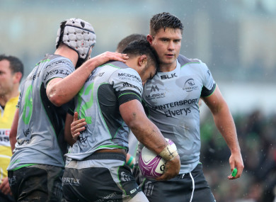 Heffernan, right, celebrates with James Connolly and Bundee Aki in the home meeting with Perpignan.