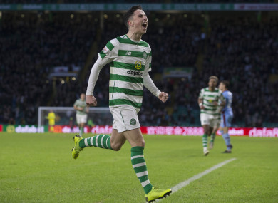 Mikey Johnston celebrates after opening the scoring for Celtic in today's win over Dundee.