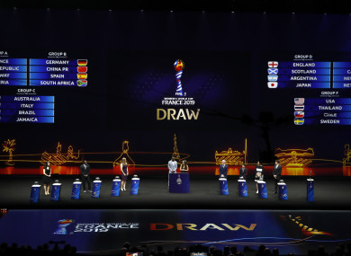 Conductors and moderators stand on the stage during the women's soccer World Cup France 2019 draw, in Boulogne-Billancourt.