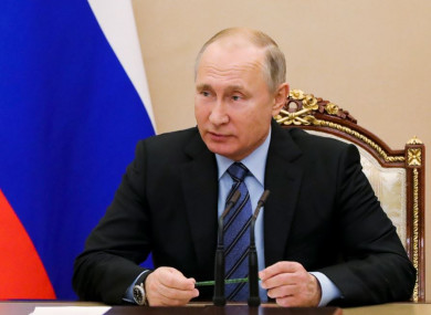 Russian President Vladimir Putin chairs a Security Council meeting in the Kremlin in Moscow on Friday.