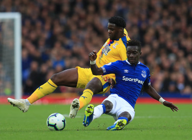 Idrissa Gueye battles for the ball with Crystal Palace's Jeffrey Schlupp.