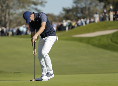 Rory McIlroy reacts after missing a putt on the second hole on the South Course at Torrey Pines Golf Course.
