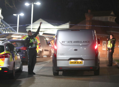 Police guard the crime scene at the railway station.