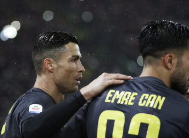 Ronaldo celebrates his winning penalty with a very relieved Emre Can.
