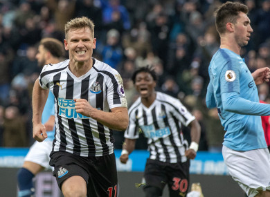 Newcastle United Matt Richie (left) celebrates scoring his side's second goal.