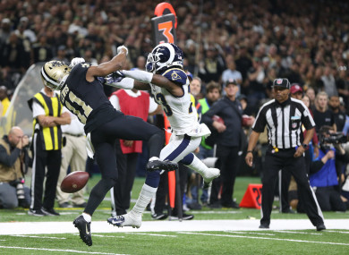 Nickell Robey-Coleman and Tommylee Lewis collide.
