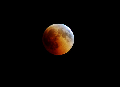 The moon is seen during a lunar eclipse in July 2018.