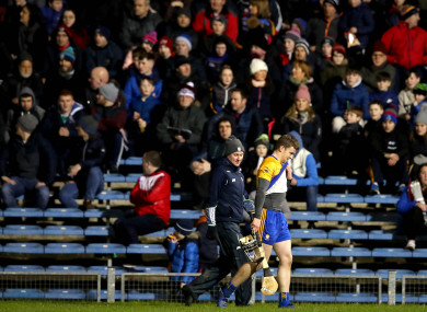 Tony Kelly leaves the pitch after being sent-off.