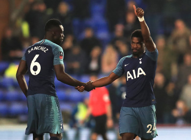 Serge Aurier celebrates Spurs' third with Davinson Sanchez.