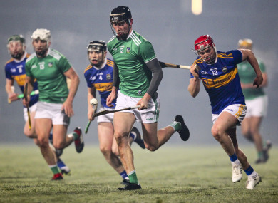 Conor Boylan races clear of the Tipp defence.