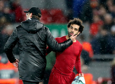 Liverpool manager Jurgen Klopp (left) with Mohamed Salah after the final whistle.