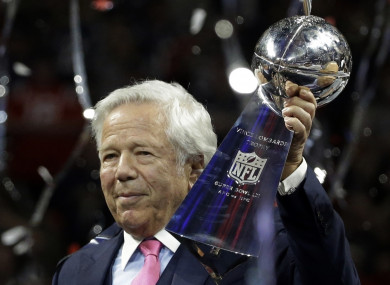 Robert Kraft holds aloft the Vince Lombardi trophy after the Patriots beat the Rams to win this year's Super Bowl.