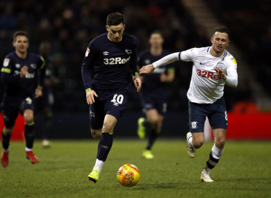 Preston North End's Alan Browne in pursuit of Tom Lawrence of Derby County.