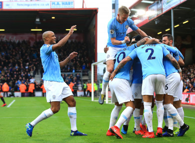 Riyad Mahrez celebrates with team-mates after going ahead.