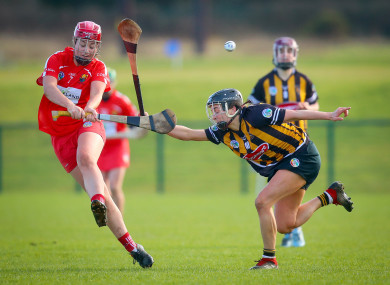 Chloe Sigerson gets the ball away with Anna Farrell in close attention.
