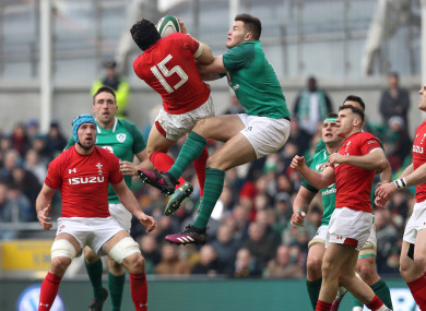 Jacob Stockdale and Leigh Halfpenny compete for a ball during last year's Six Nations.