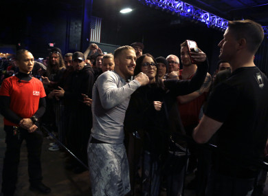 MMA star Justin Gaethje poses with fans after a pre-fight workout in Philly.