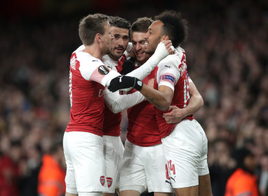 Arsenal players celebrate Ramsey's goal.