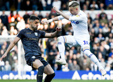 Leeds United's Ezgjan Alioski (right) challenges Marco Matias of Sheffield Wednesday.
