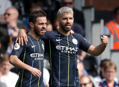 Manchester City's Sergio Aguero and team-mate Bernardo Silva celebrate.