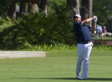Shane Lowry hits from the fairway of the third hole at the RBC Heritage.
